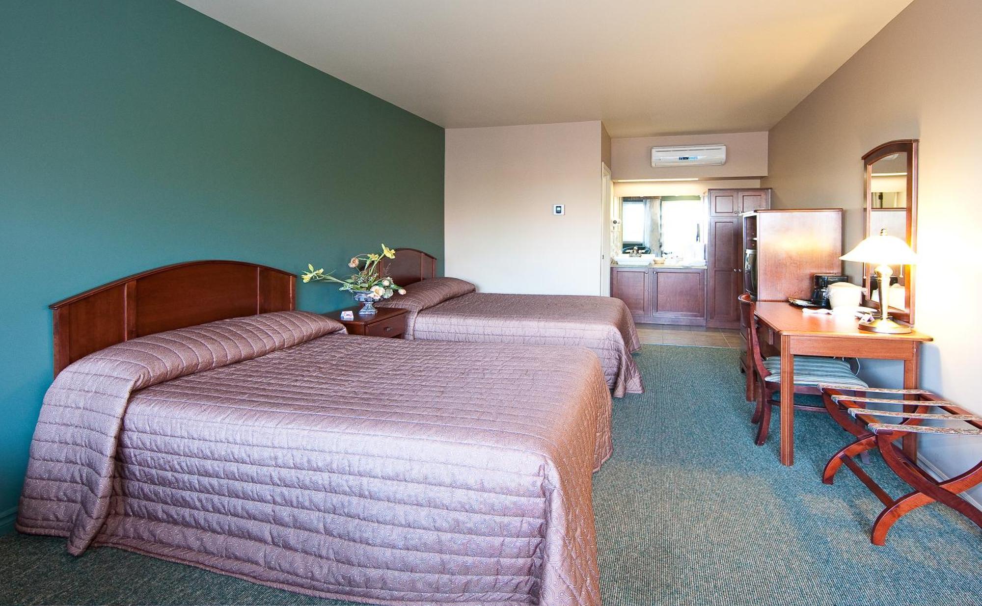 Hotel-Motel Drummond Дрюммондвилл Экстерьер фото