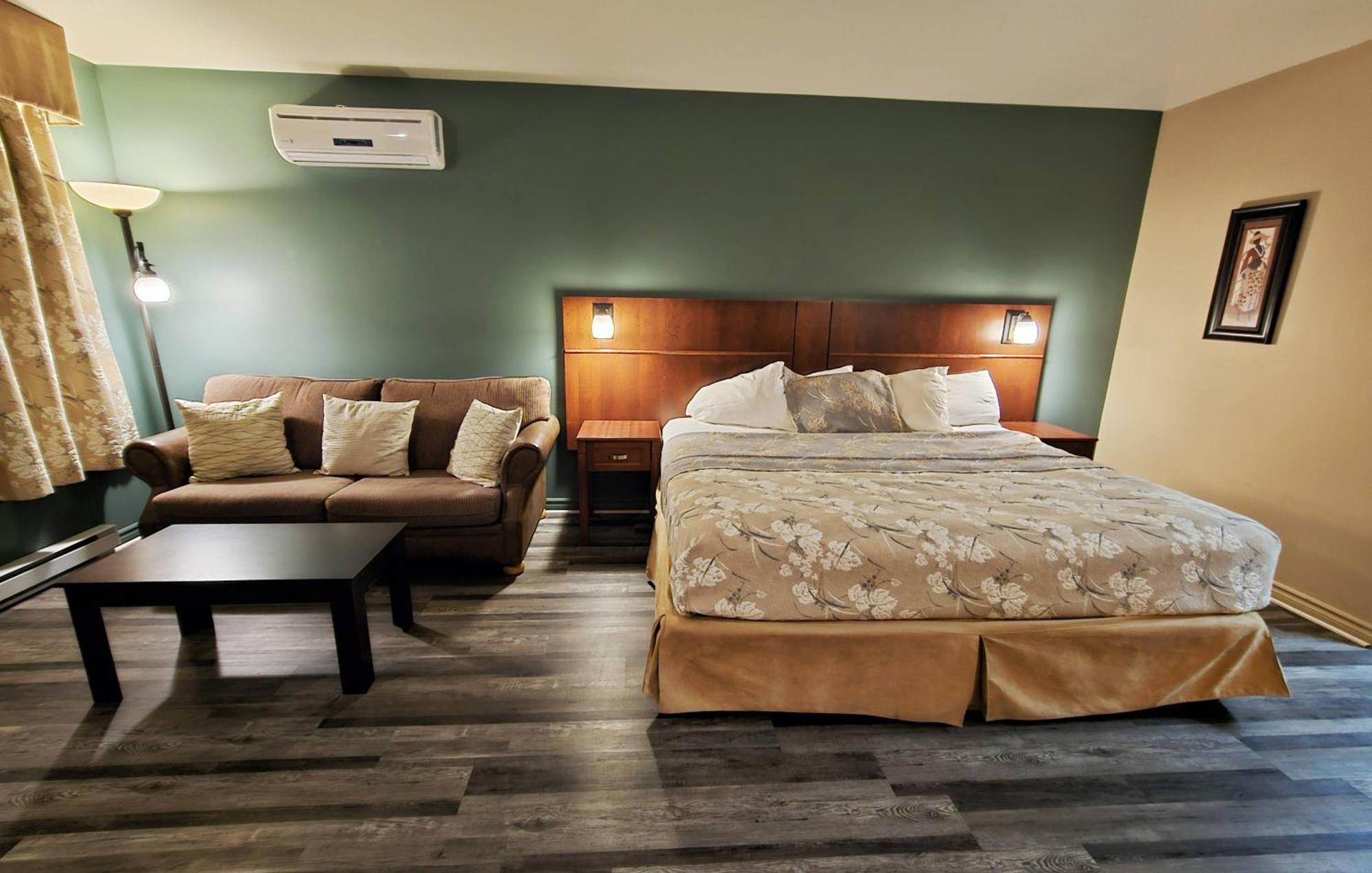 Hotel-Motel Drummond Дрюммондвилл Экстерьер фото