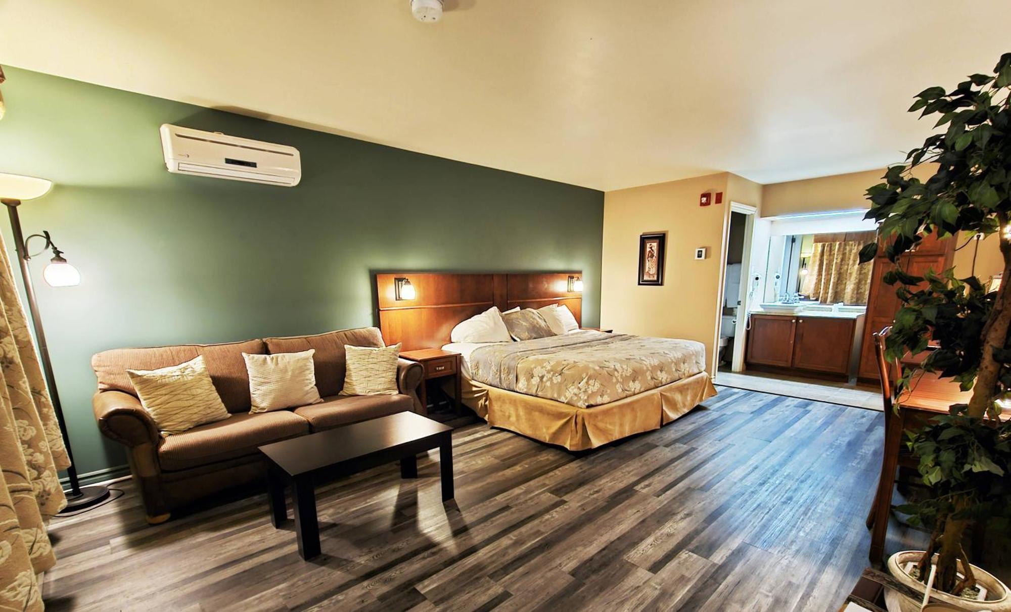 Hotel-Motel Drummond Дрюммондвилл Экстерьер фото